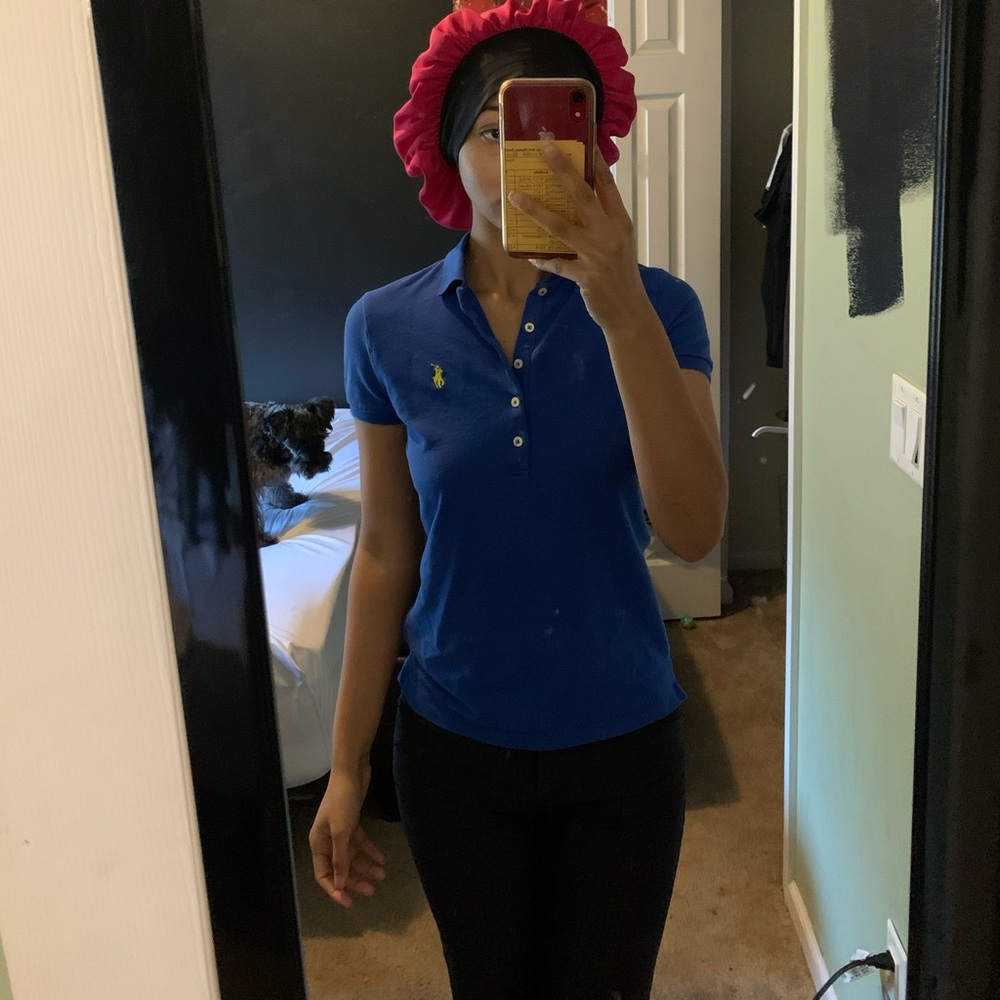 blue polo shirt with yellow symbol // size small